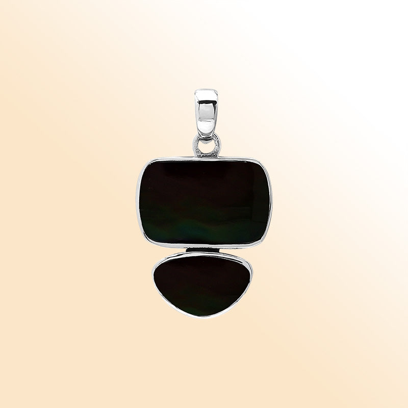 Handcrafted sterling silver pendant featuring two Black Shell stones, smooth mirror-polished surface, and fine Balinese artistry.