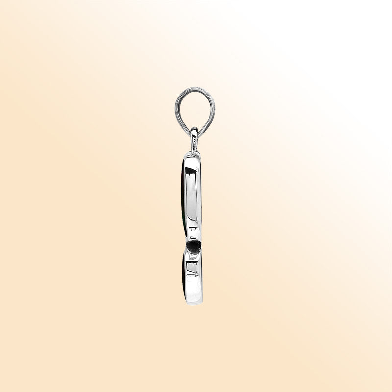 Handcrafted sterling silver pendant featuring two Black Shell stones, smooth mirror-polished surface, and fine Balinese artistry.
