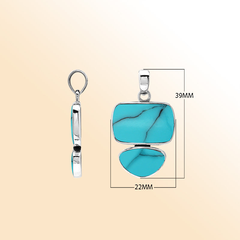 Handcrafted sterling silver pendant with two Turquoise Shell stones, mirror-polished surface, and detailed modern Balinese craftsmanship.