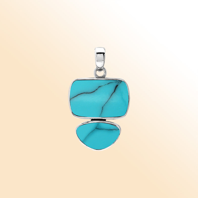 Handcrafted sterling silver pendant with two Turquoise Shell stones, mirror-polished surface, and detailed modern Balinese craftsmanship.