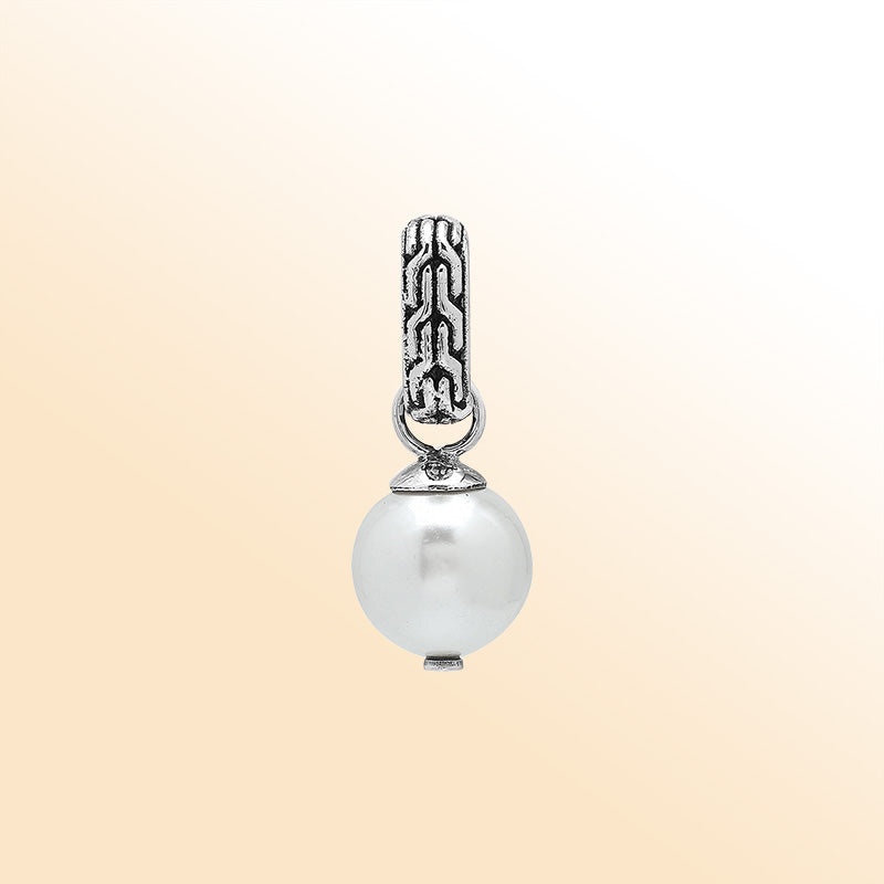 Elegant sterling silver round drop pendant featuring a radiant Mabe Pearl and Balinese silver detailing with smooth high-gloss finish.