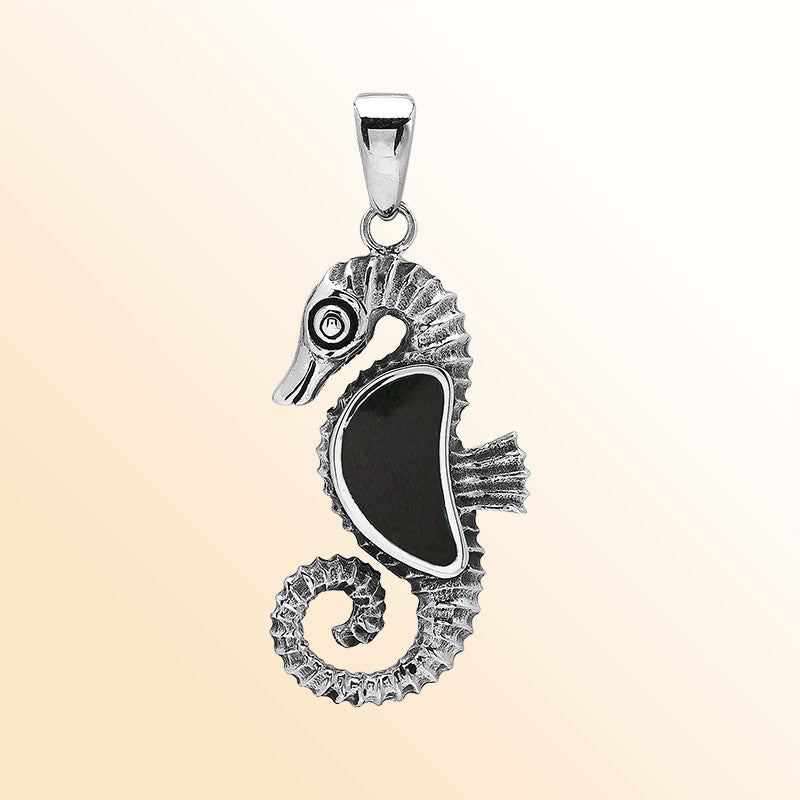 Elegant sterling silver seahorse pendant with polished Black Shell and Balinese handcrafted design.