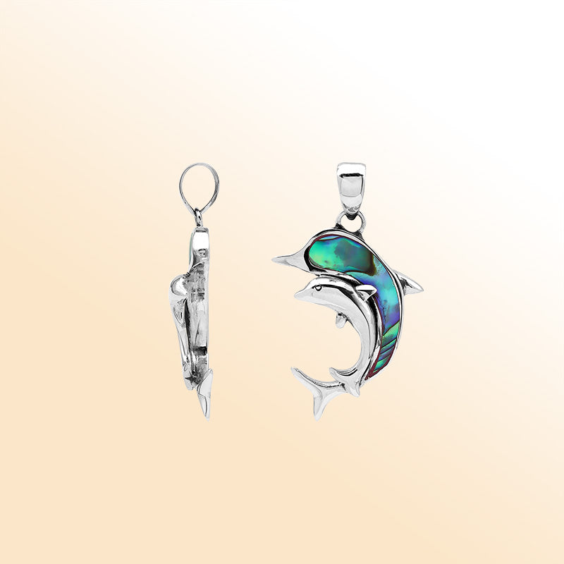 Elegant sterling silver dolphin pendant with abalone shell inlay and Balinese craftsmanship in a high-polish ocean-inspired design.