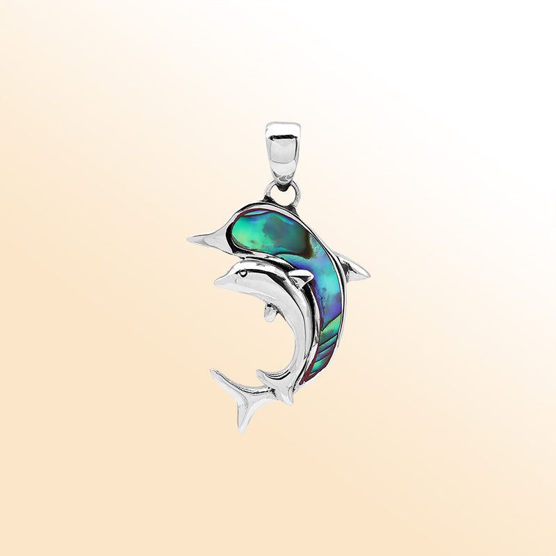 Elegant sterling silver dolphin pendant with abalone shell inlay and Balinese craftsmanship in a high-polish ocean-inspired design.