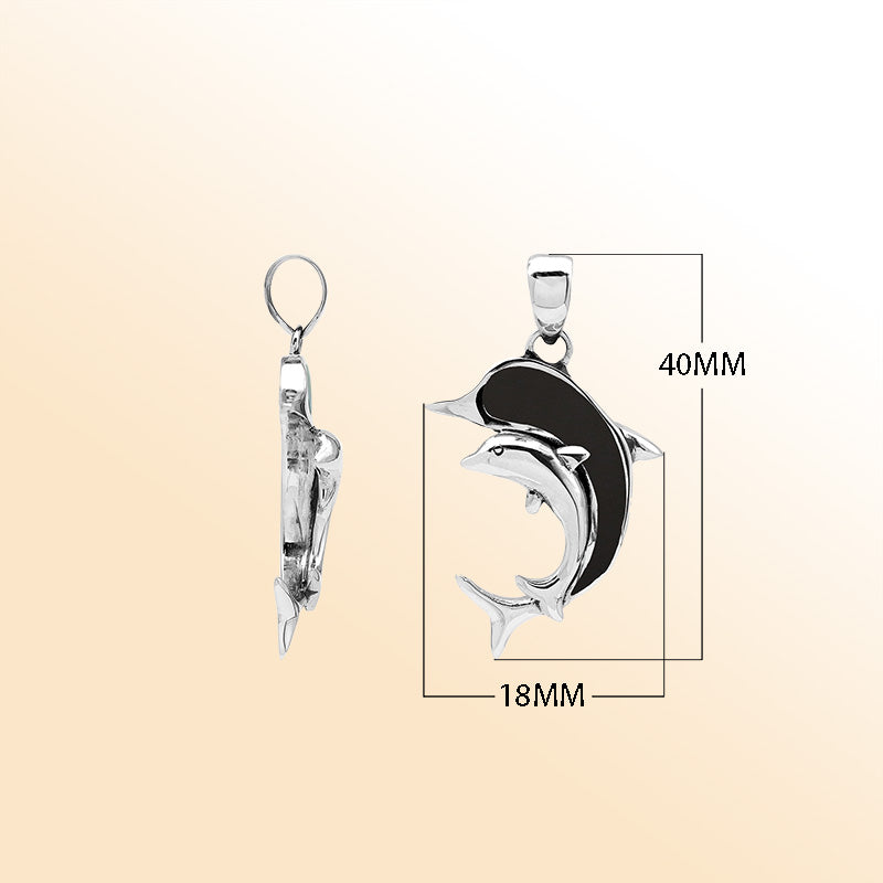Elegant sterling silver dolphin pendant with black shell inlay and Balinese craftsmanship in a polished ocean-inspired design.