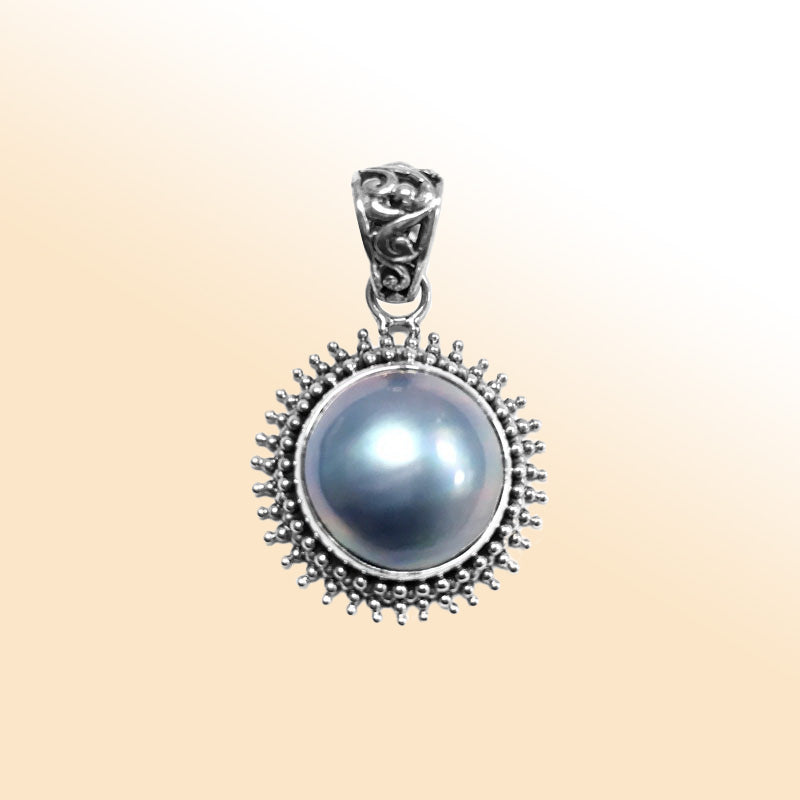 Elegant sterling silver gray Mabe Pearl pendant with oxidized Balinese handcrafted beaded design.