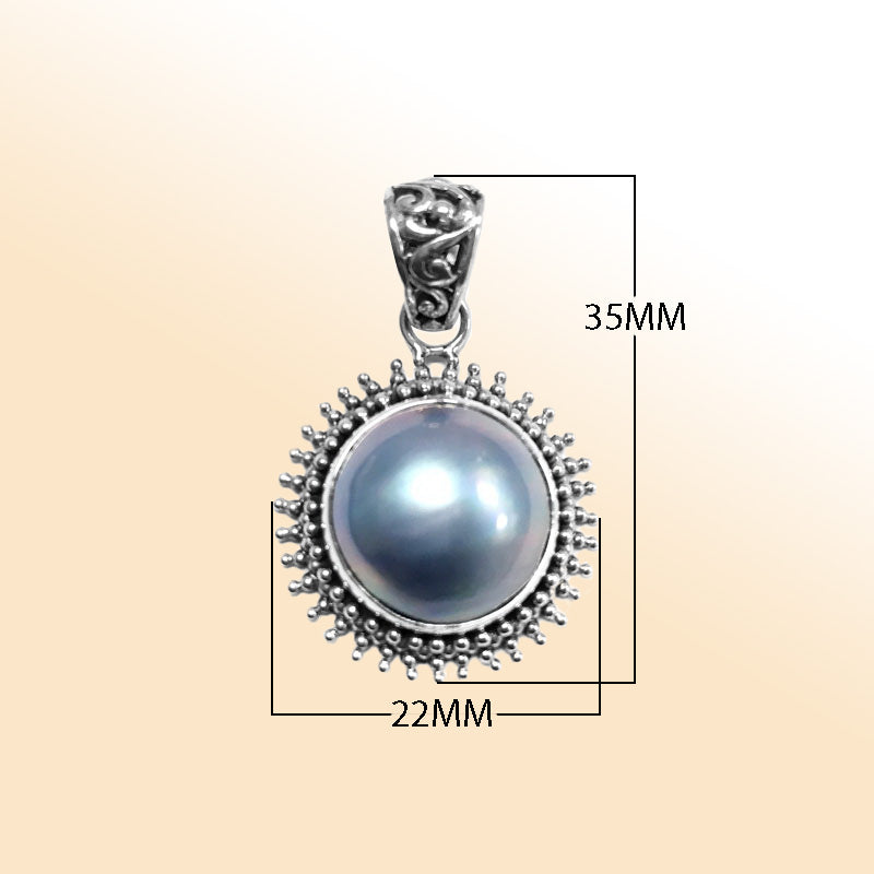 Elegant sterling silver gray Mabe Pearl pendant with oxidized Balinese handcrafted beaded design.