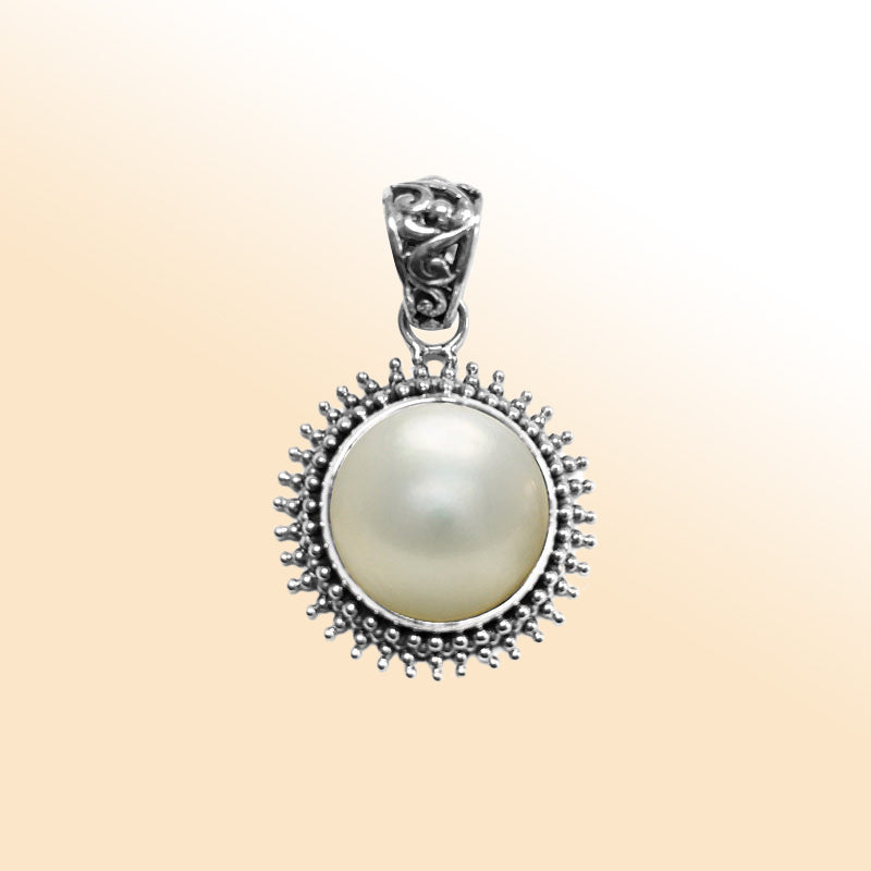 Elegant sterling silver Mabe Pearl pendant with oxidized Balinese handcrafted beaded frame.