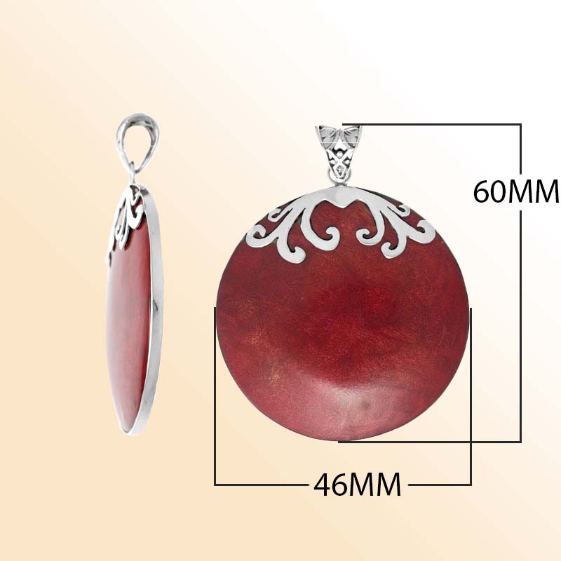 Elegant sterling silver Red Coral pendant with polished scroll design handcrafted in Bali.