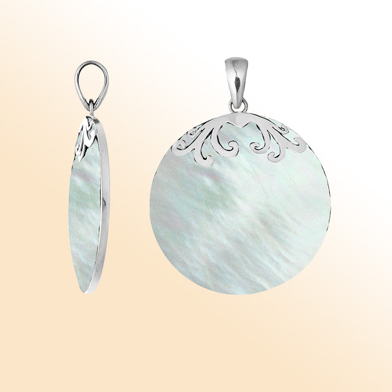 Elegant sterling silver Mother Of Pearl pendant with polished scroll design handcrafted in Bali.