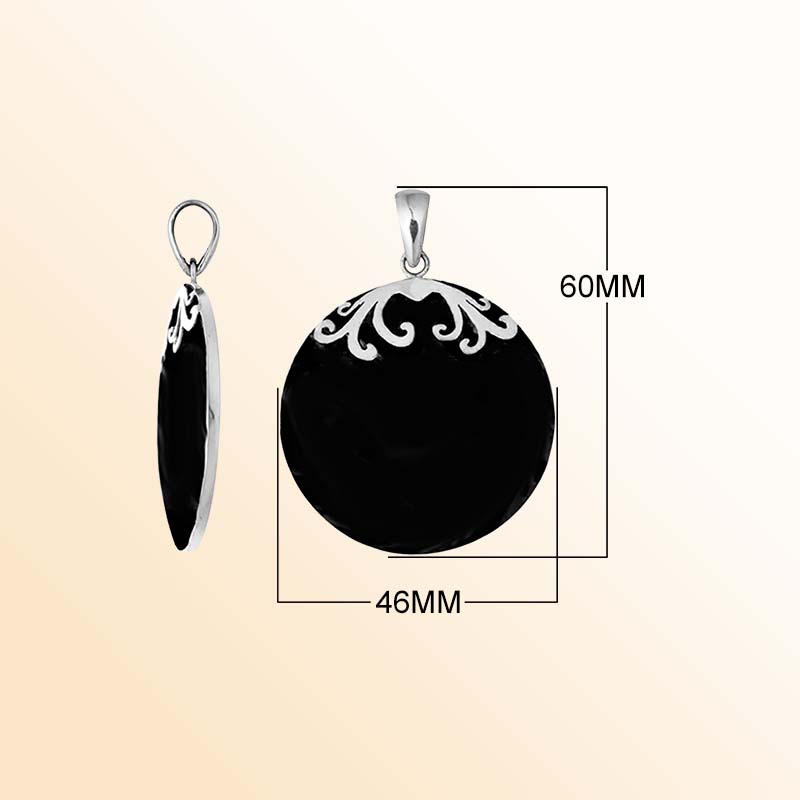 Elegant sterling silver circular pendant showcasing a glossy midnight-black shell, delicate symmetrical silver floral scroll accents crowning the upper edge, smooth rounded edges, and a beautifully polished hanging bail.