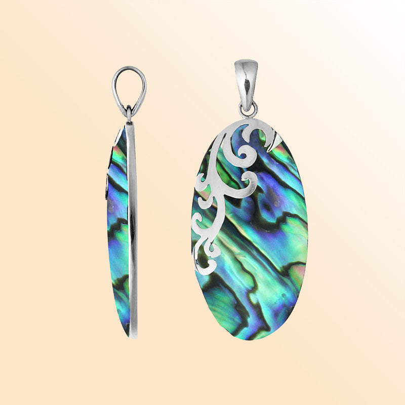 Artisan sterling silver pendant with vibrant abalone shell and flowing swirl accents in a polished finish.