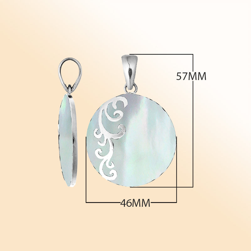 Artisan sterling silver pendant with luminous Mother of Pearl and flowing swirl accents.