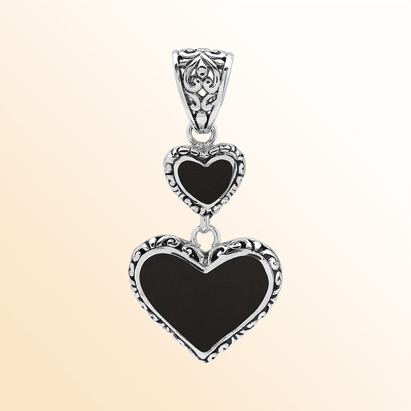 Artisan sterling silver double heart pendant with Black Shell and Balinese accents.