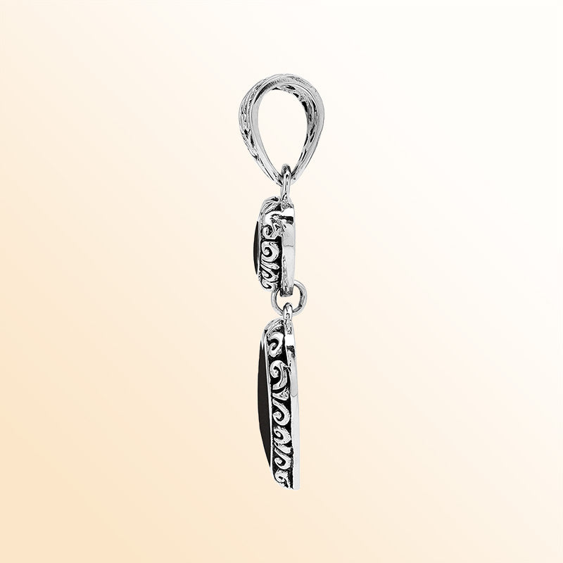 Artisan sterling silver double heart pendant with Black Shell and Balinese accents.