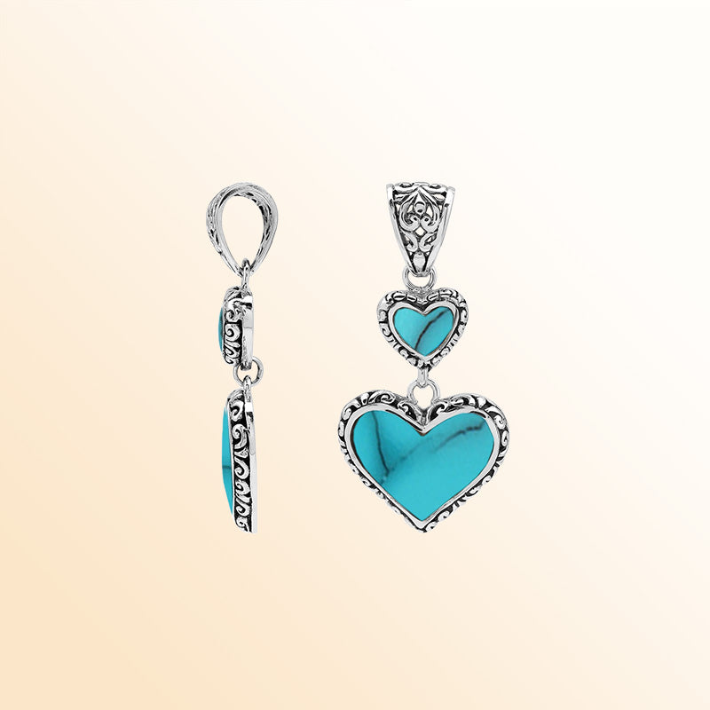 Artisan sterling silver double heart pendant with Turquoise Shell and Balinese accents.