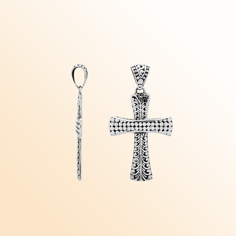 Artisan sterling silver engraved cross pendant with Balinese accents.