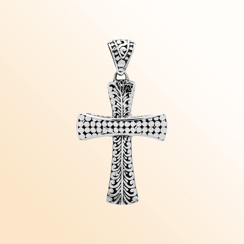 Artisan sterling silver engraved cross pendant with Balinese accents.