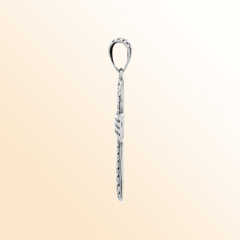 Artisan sterling silver engraved cross pendant with Balinese accents.