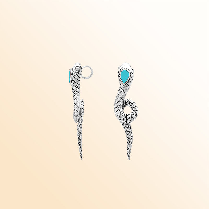 Artisan sterling silver snake pendant with turquoise shell and flowing serpentine details.