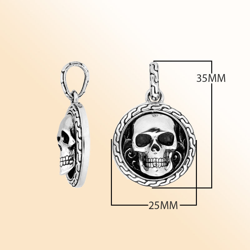 Artisan sterling silver skull pendant with carved border and polished finish.