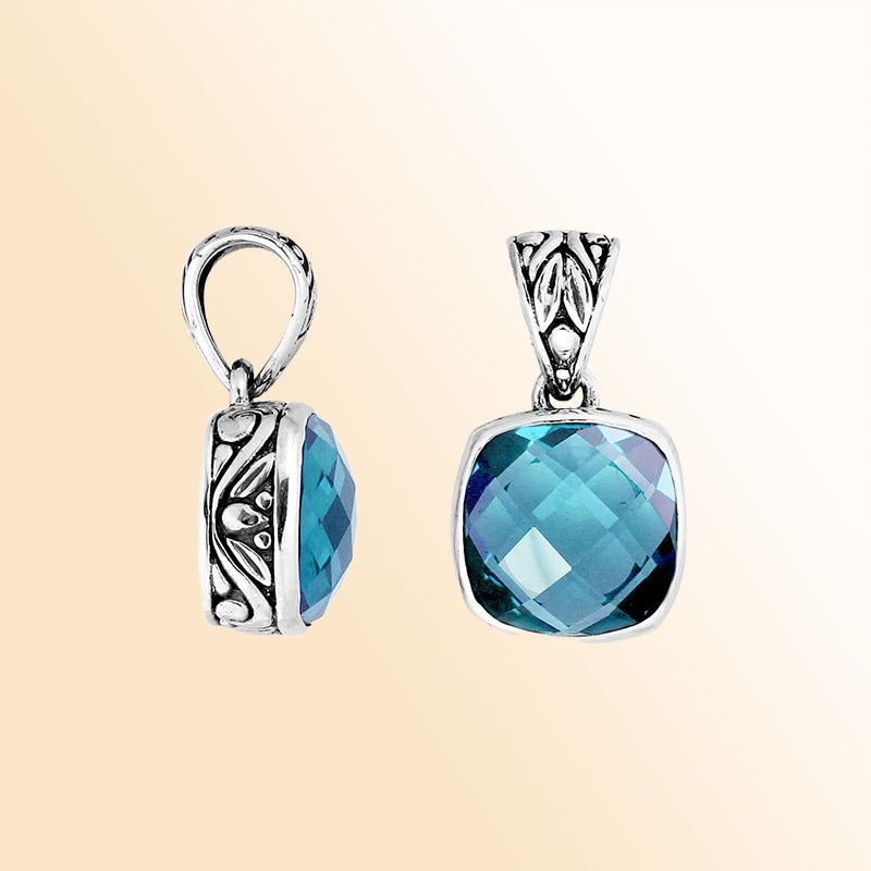 Artisan sterling silver Blue Topaz Quartz cushion pendant with detailed Balinese enhancer bail.