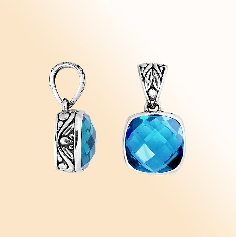 Artisan sterling silver London Blue Topaz Quartz pendant with detailed Balinese enhancer bail.