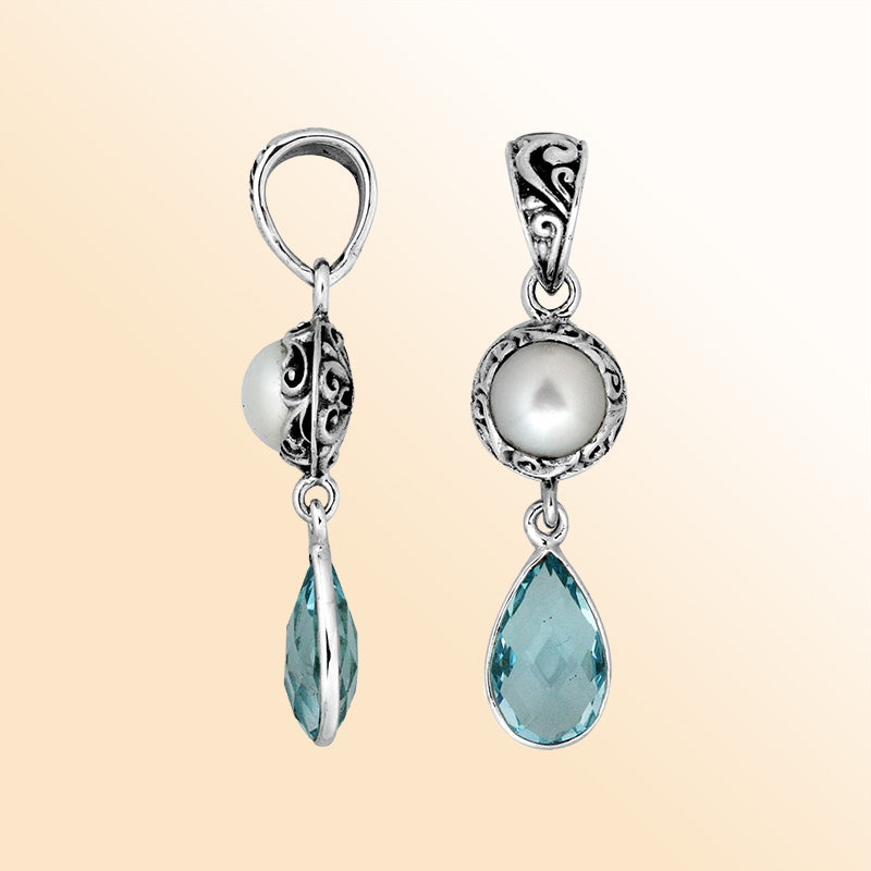 Artistic sterling silver Mabe Pearl and Blue Topaz Quartz dual-drop pendant.