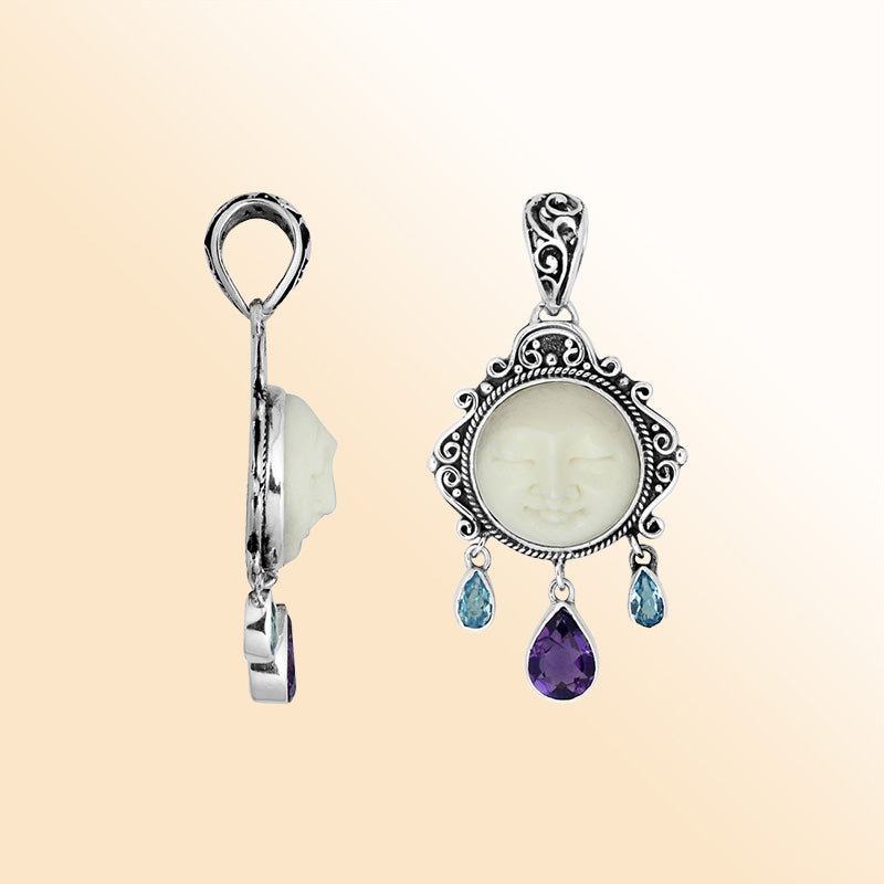 Artistic sterling silver Bone Face pendant with Amethyst Quartz and Blue Topaz Quartz.