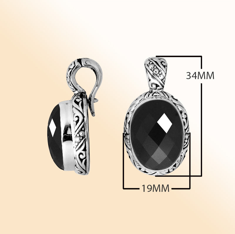 Handcrafted sterling silver pendant featuring a faceted Black Onyx framed with artistic Balinese details and a polished high-gloss finish.