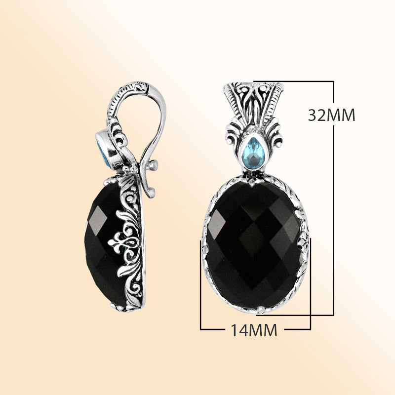 Handcrafted sterling silver pendant featuring Black Onyx and Blue Topaz Quartz with artistic Balinese detailing and a polished glossy finish.