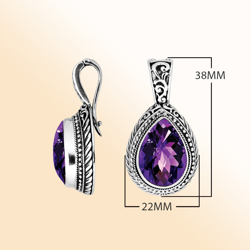 Handcrafted sterling silver teardrop pendant featuring faceted Amethyst Quartz with artistic Balinese detailing and a high-gloss polished finish.