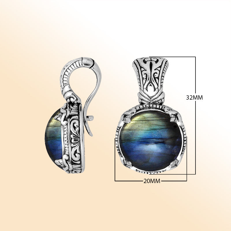 Handcrafted sterling silver cushion pendant featuring Labradorite with artistic Balinese detailing and a polished glossy finish.