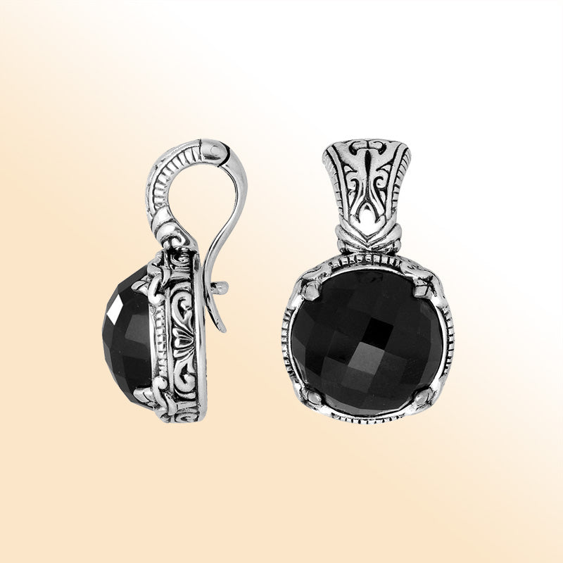 Handcrafted sterling silver cushion pendant featuring Black Onyx with artistic Balinese detailing and a polished glossy finish.