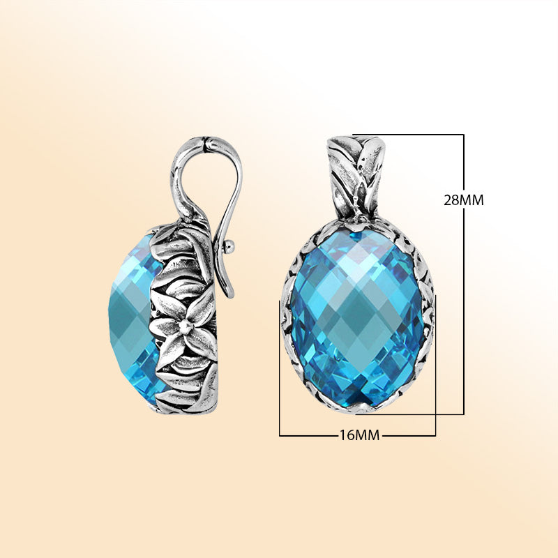 Elegant sterling silver oval-shaped Blue Topaz Quartz pendant with engraved floral detailing and enhancer bail, mirror-polished for modern elegance and timeless sophistication.