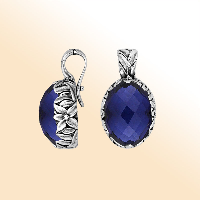 Handcrafted sterling silver pendant featuring Sapphire Quartz with artistic Balinese floral detailing.