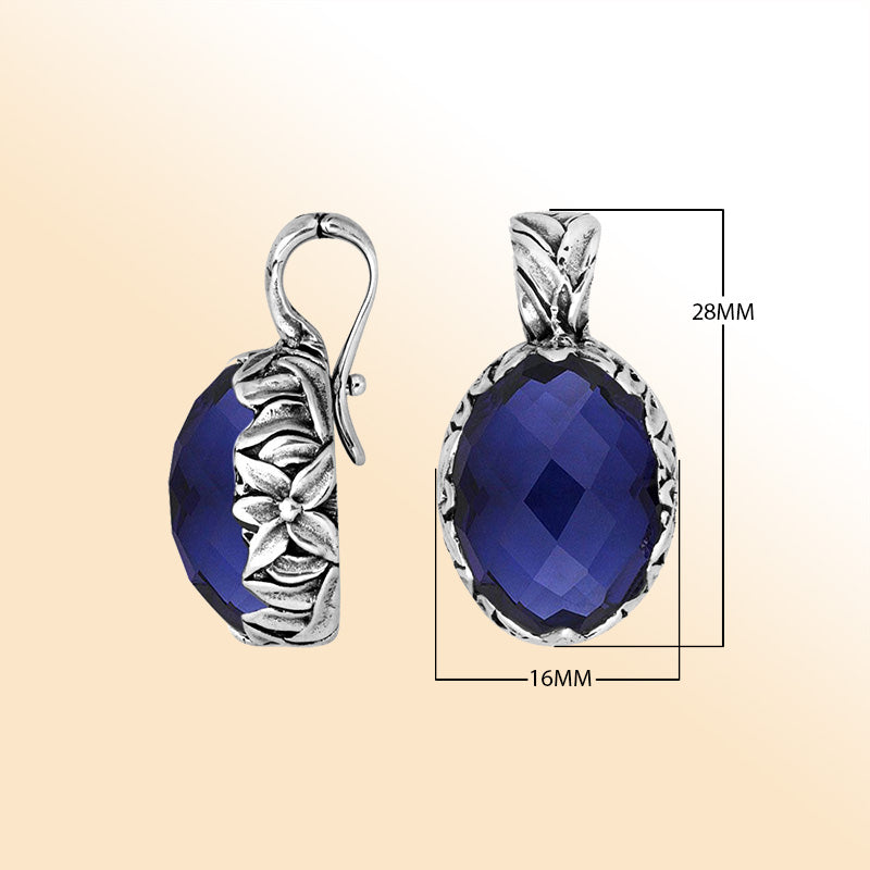 Handcrafted sterling silver pendant featuring Sapphire Quartz with artistic Balinese floral detailing.
