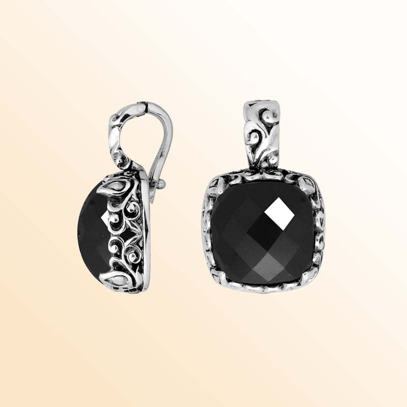 Handcrafted sterling silver pendant featuring Black Onyx with artistic Balinese scroll detailing.