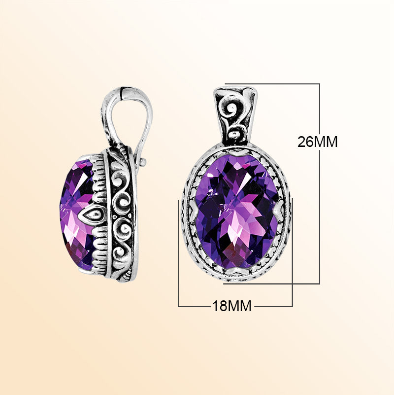 Handcrafted sterling silver pendant featuring an oval Amethyst Quartz centerpiece enhanced with smooth artistic scroll carvings and a polished decorative frame for expressive personal styling.