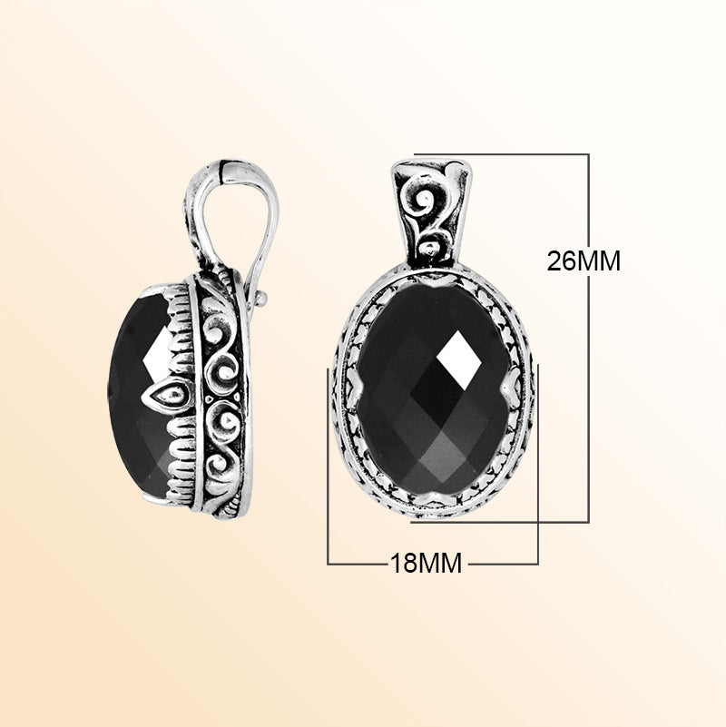 Handcrafted sterling silver pendant featuring a deep Black Onyx centerpiece accented with artistic Balinese scroll carvings and a polished decorative frame ideal for expressive everyday styling.