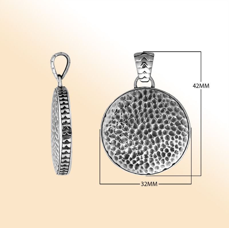Handcrafted sterling silver round pendant featuring a hammered texture surface with artistic detailing and a polished decorative frame suitable for expressive everyday styling.