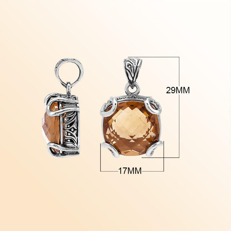 Handcrafted sterling silver cushion pendant featuring a glowing Morganite Quartz centerpiece enhanced with artistic prong work and Balinese carved decorative detailing.