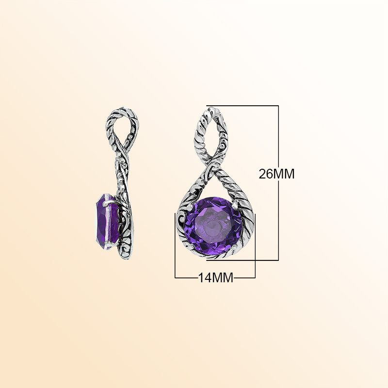 Handcrafted sterling silver twisted loop pendant featuring a round faceted Amethyst Quartz with artistic engraved detailing and expressive Balinese styling.