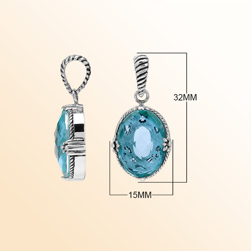 Handcrafted sterling silver oval pendant featuring Blue Topaz Quartz with rope-textured Balinese accents.