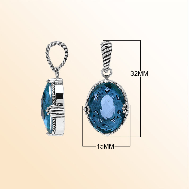 Handcrafted sterling silver pendant featuring London Blue Topaz Quartz in a rope-textured Balinese oval frame.