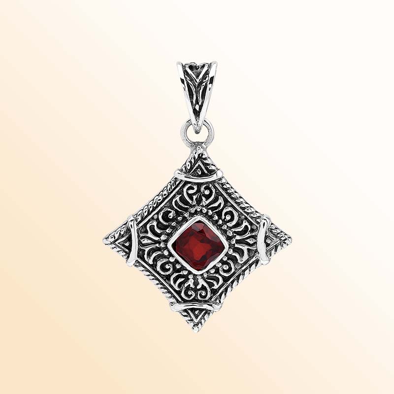 Handcrafted sterling silver Garnet Quartz heritage pendant with intricate Balinese detailing