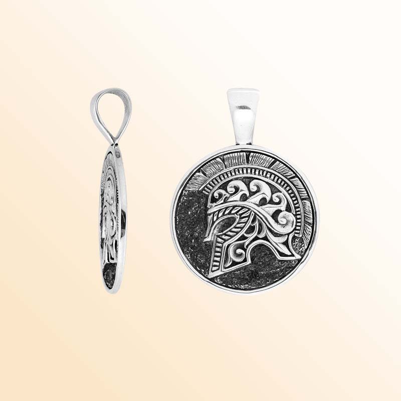 Artistic round sterling silver pendant featuring an engraved warrior helmet motif with textured detailing and polished edges for a bold modern jewelry styleArtistic round sterling silver pendant featuring an engraved warrior helmet motif with textured detailing and polished edges for a bold modern jewelry style