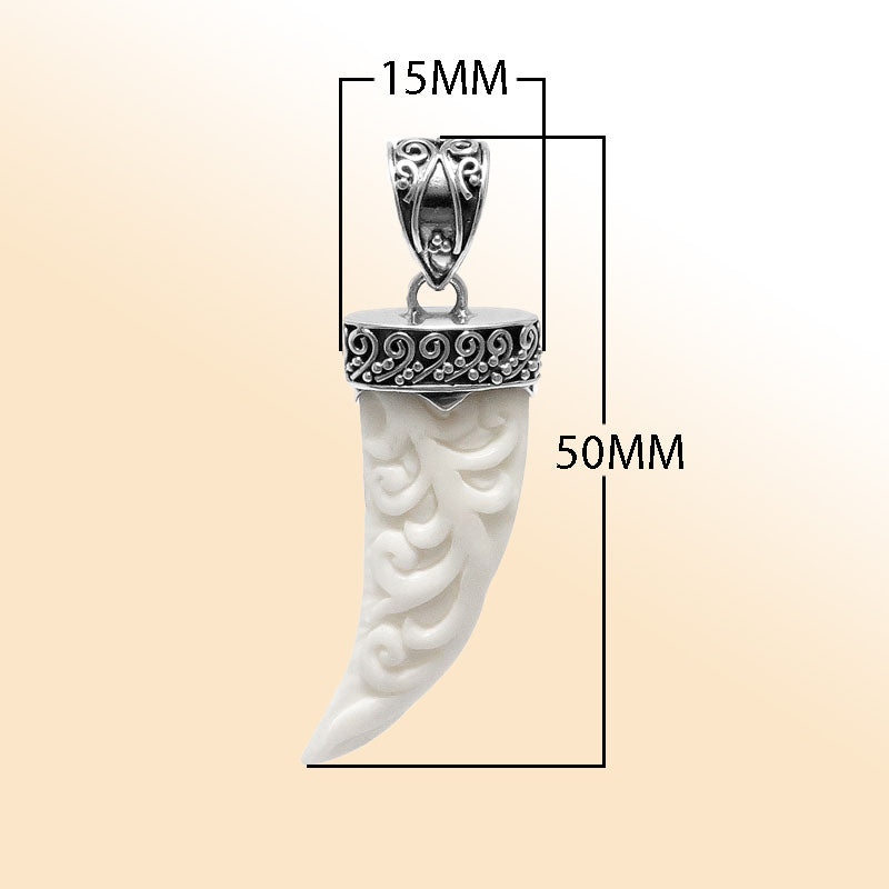 Artistic sterling silver carved bone horn pendant with Balinese decorative cap and polished finish designed for modern expressive jewelry wearers