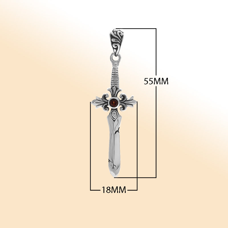 Artistic sterling silver sword pendant featuring a Red Garnet Quartz center stone and detailed filigree guard for expressive modern jewelry wearers