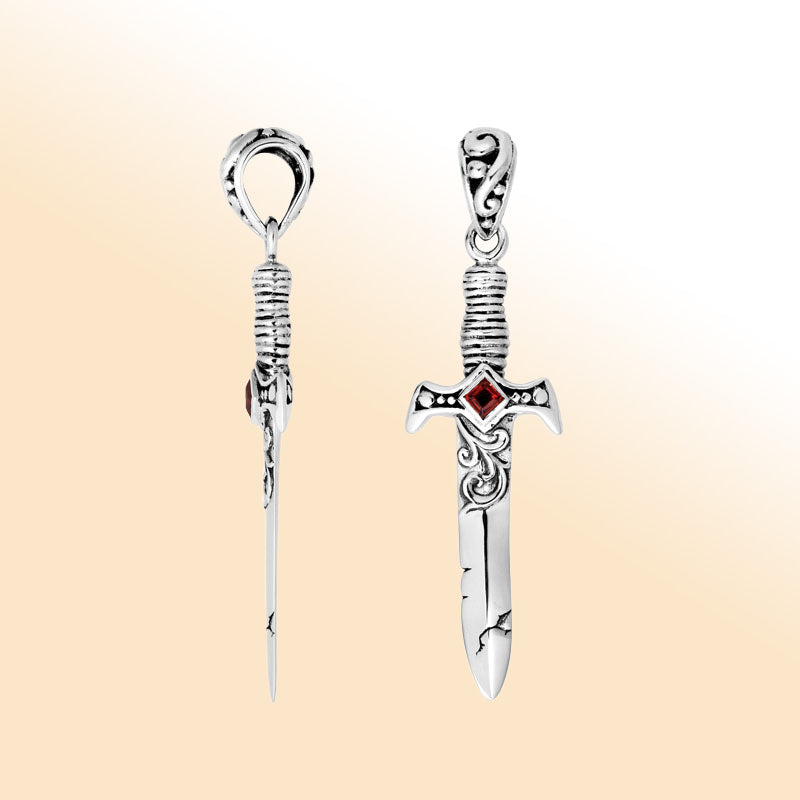 Artistic sterling silver sword pendant with Red Garnet Quartz centerpiece and carved details ideal for modern fashion-forward jewelry lovers